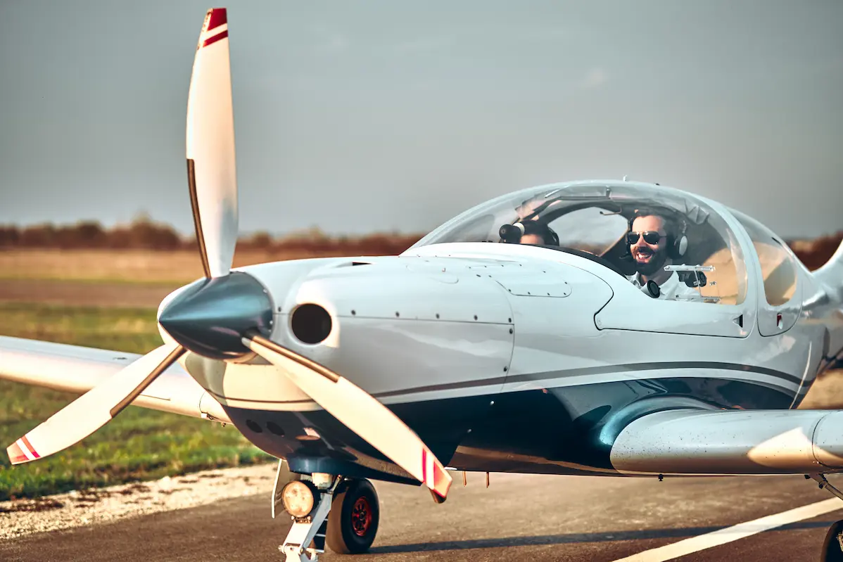 Pilots in a single-engine aircraft on a runway — AIRAF Question Bank