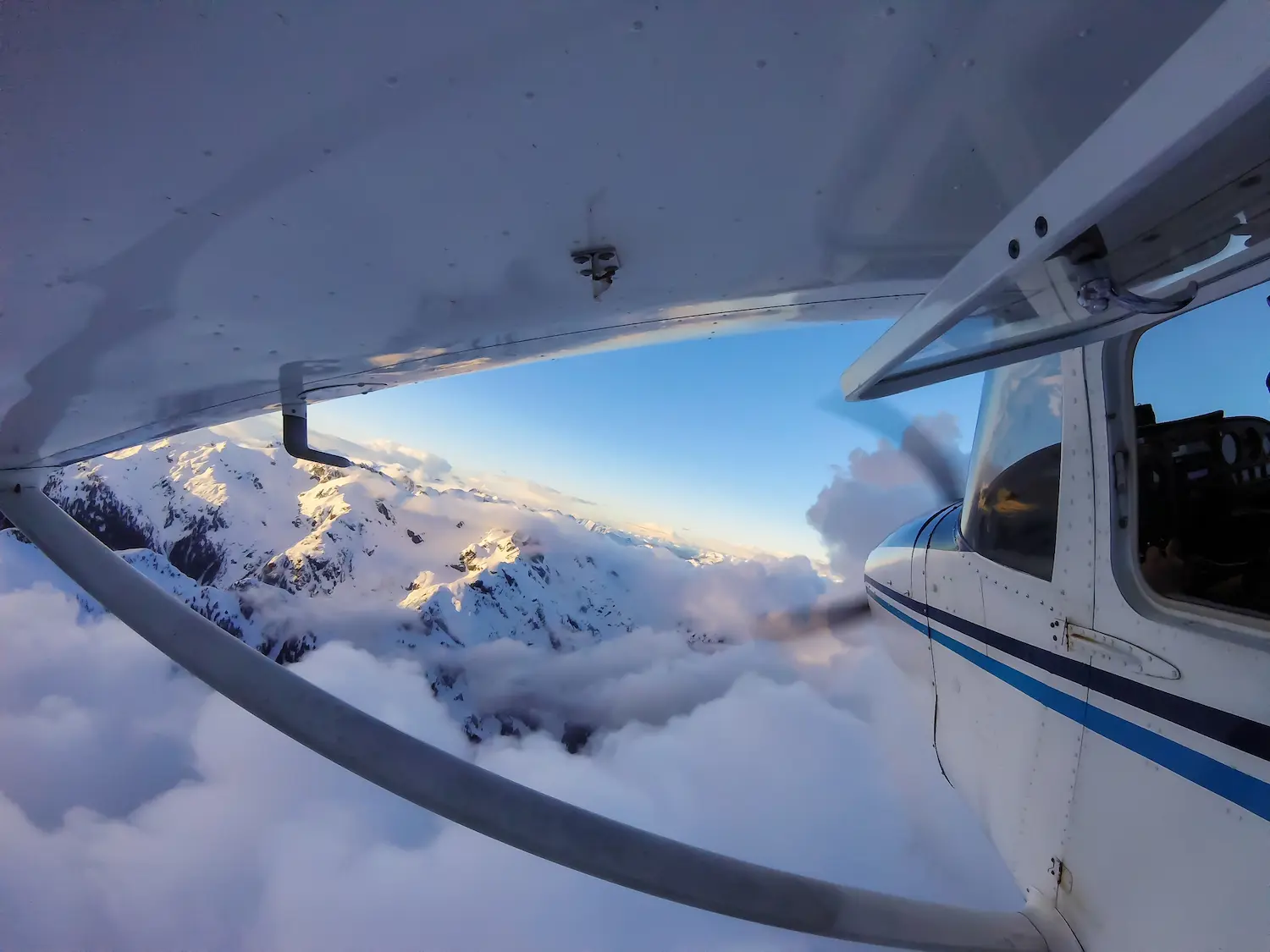 Light aircraft flying above mountain clouds — Commercial Pilot Question Bank