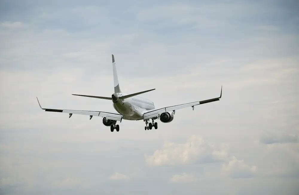 Passenger airliner approaching through clouds — FAA to Transport Canada Airline Transport Pilot Conversion