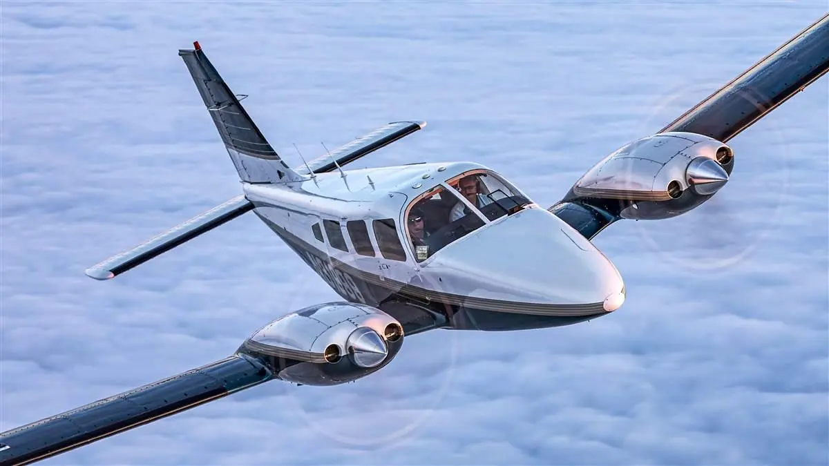 Twin-engine aircraft in flight — Instrument Rating Ground School